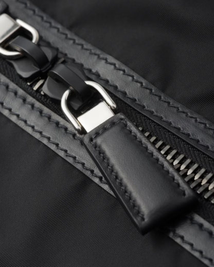 Re-Nylon and leather travel bag